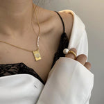 Load image into Gallery viewer, Gold Heart Tag Pearl Necklace
